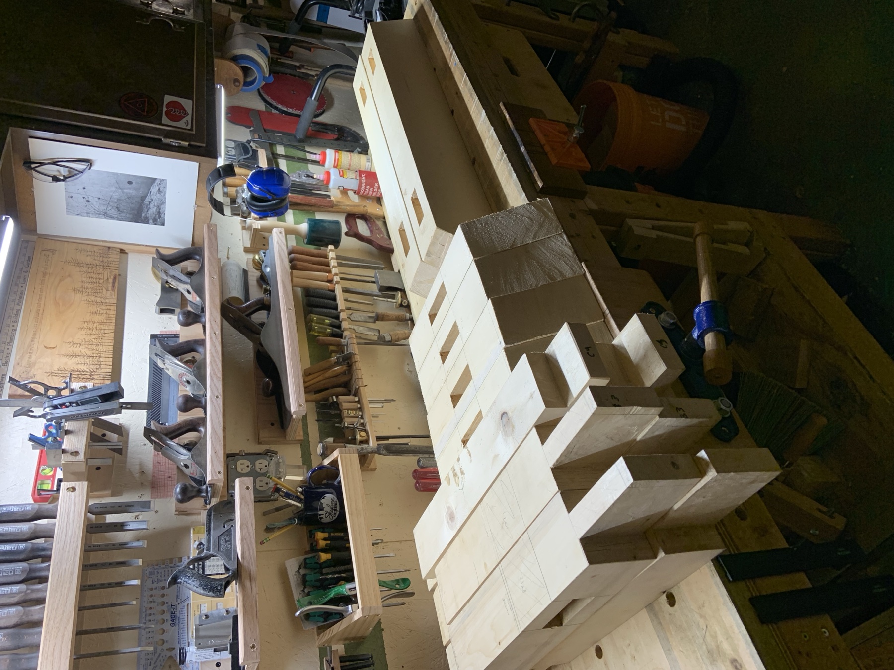 John Hurr woodworking in his shop